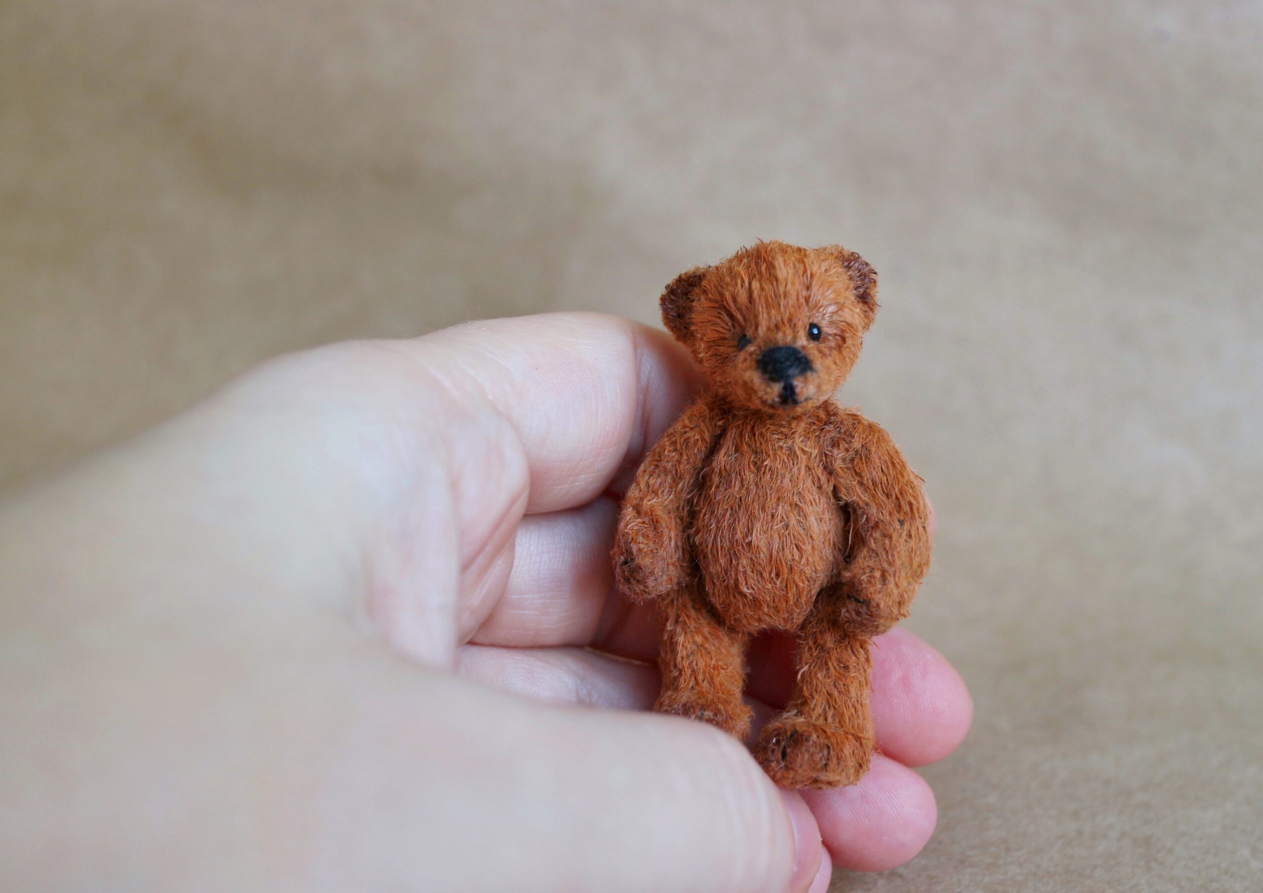 tiny plush bear