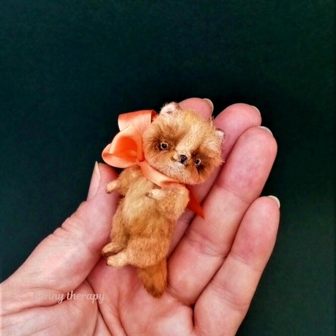 tiny stuffed cat