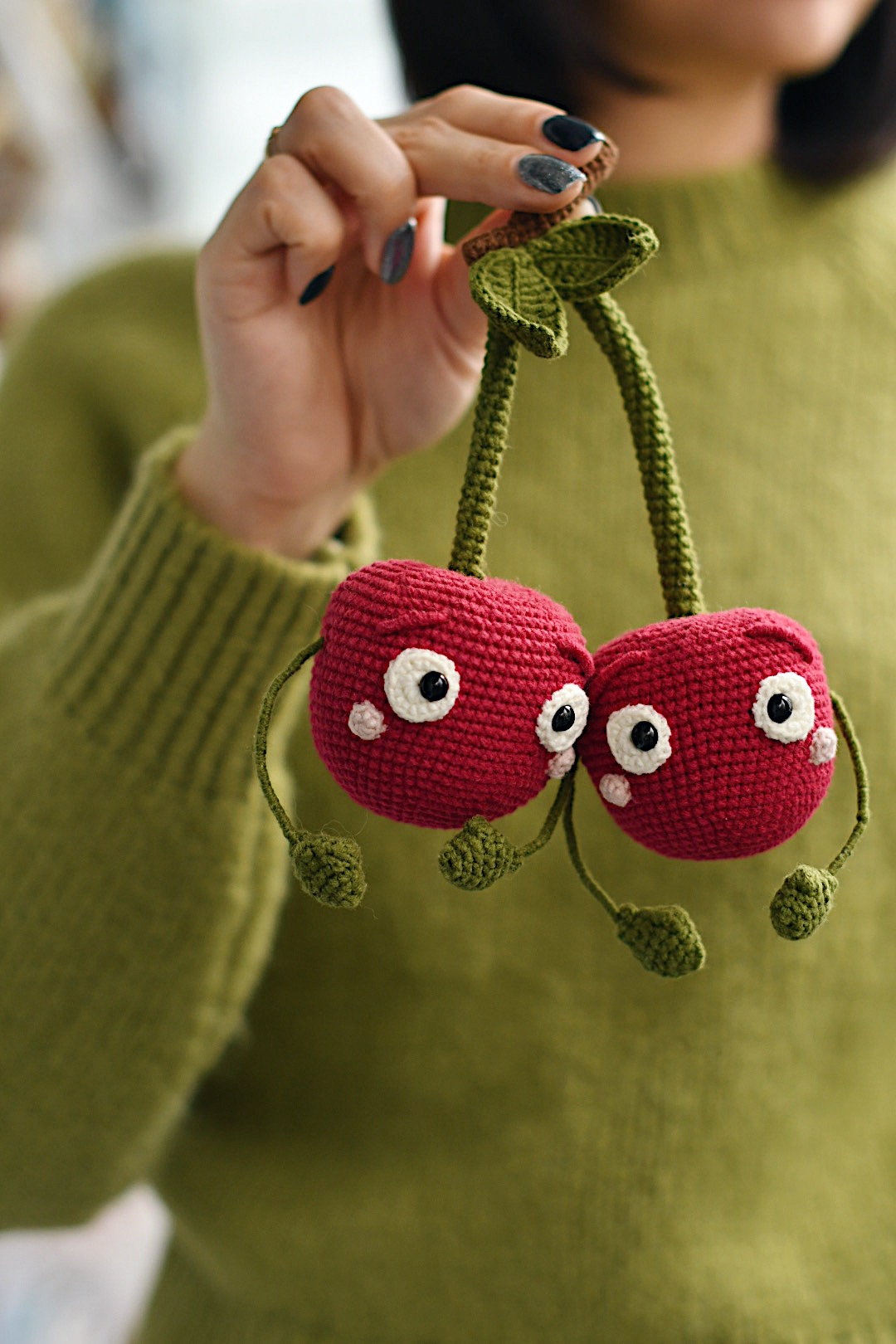 Knitted cherry keychain