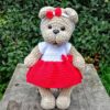 Crochet amigurumi plush teddy bear pattern in a dress
