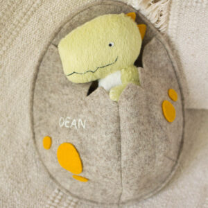 lime plush dinosaur in felt egg