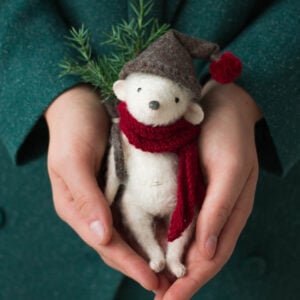 elf doll mouse with bag in hands