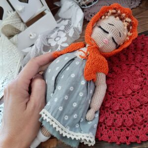 Boudoir doll with closed eyes