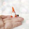 orange miniature knitted Scandinavian gnome brings good luck