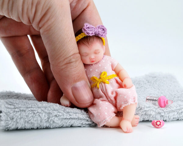 Mini lifelike on sale baby dolls