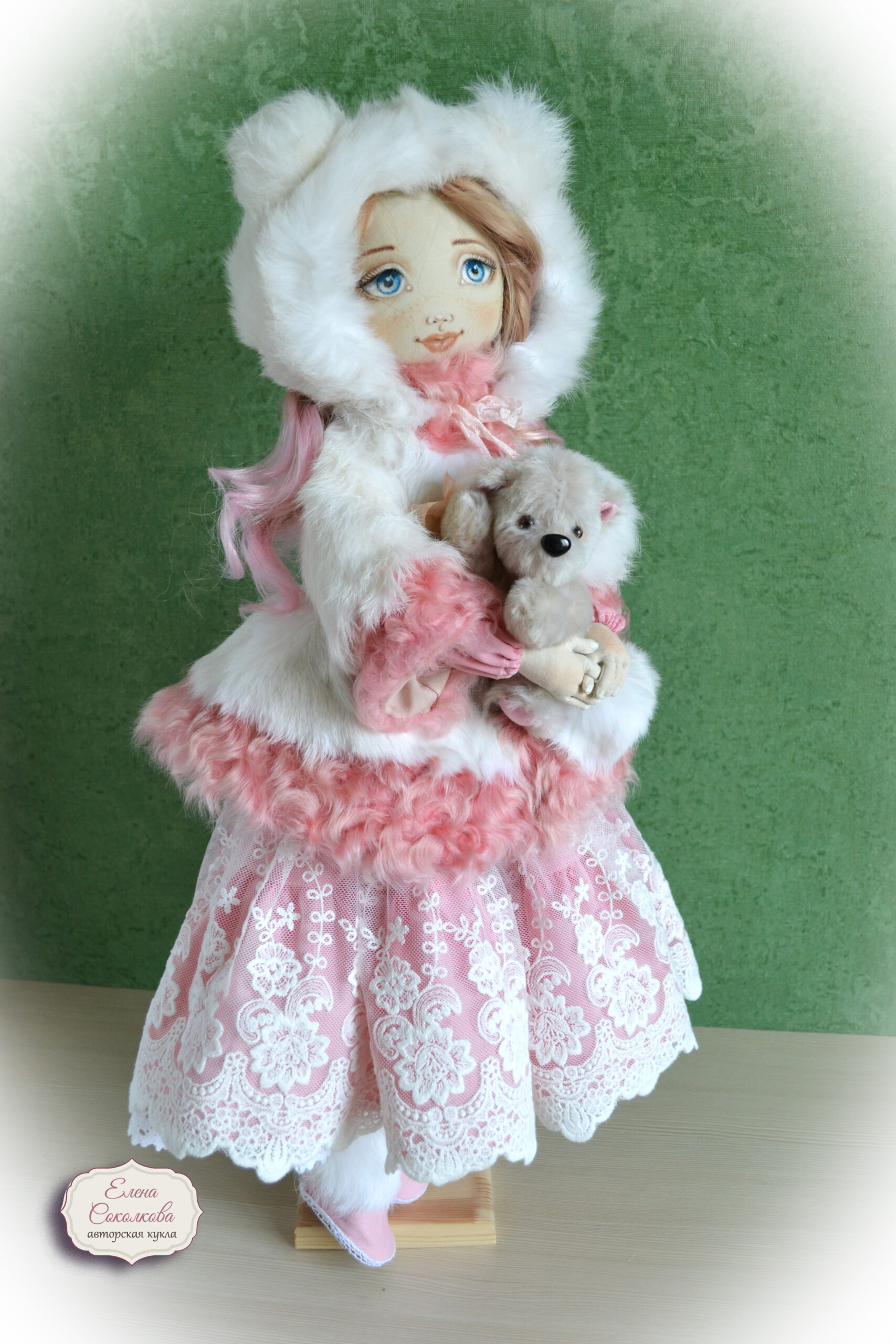 porcelain doll with teddy bear