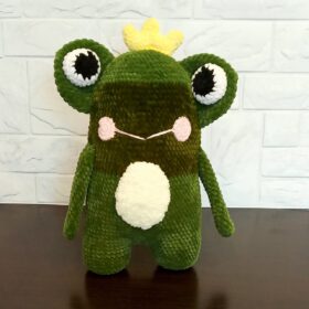 Soft toy frog. Children's frog soft pillow for a children's room.