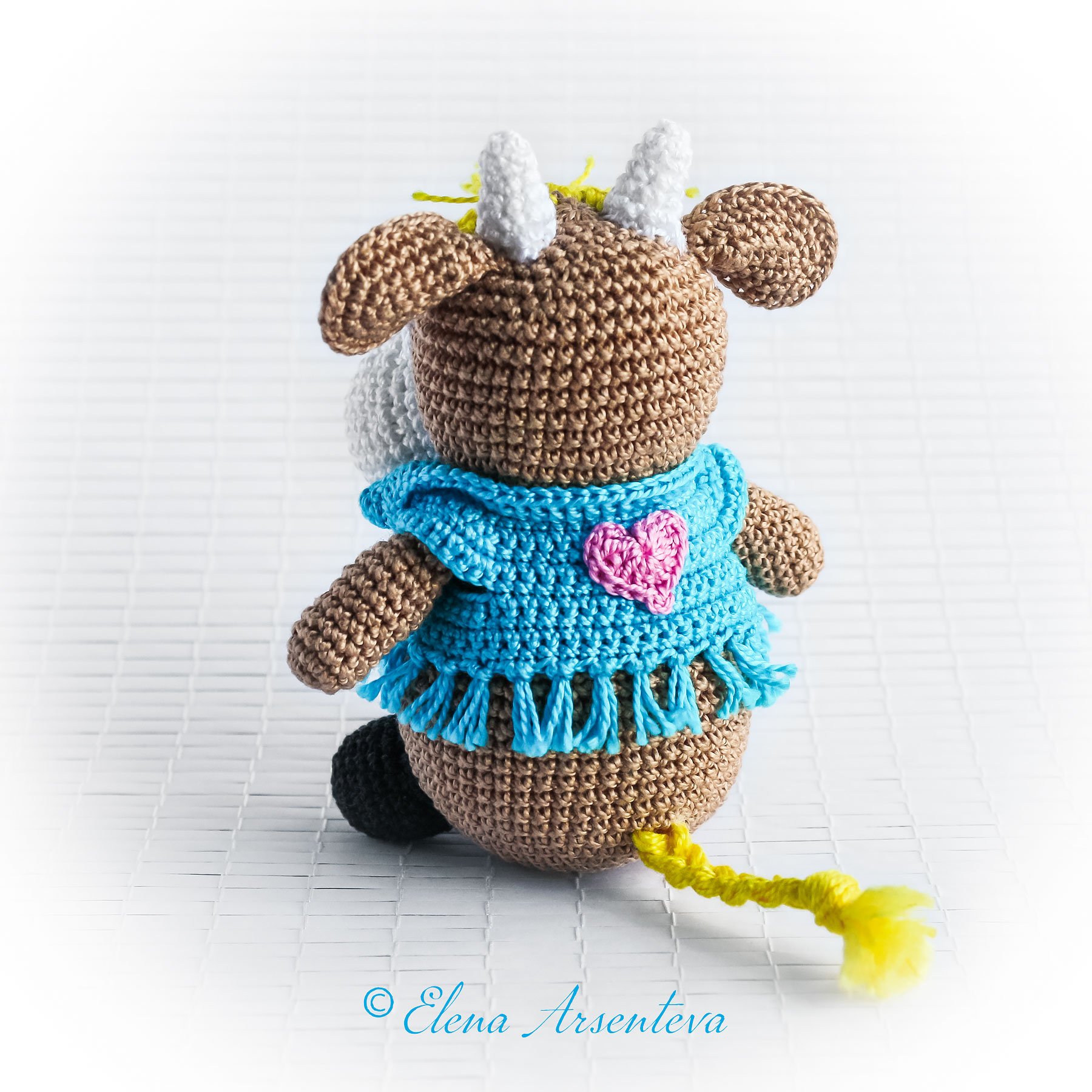 Crochet pattern to make a very cute mini bull toy.