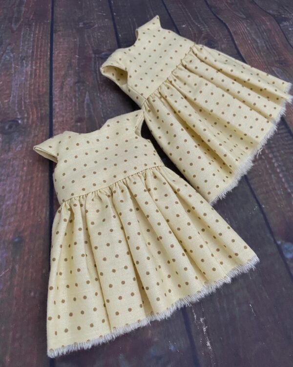 Beige polka dots dress for doll