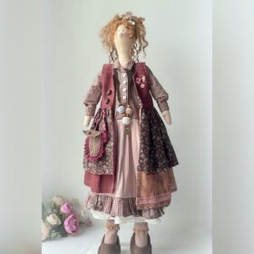 Textile doll for the interior. The doll handmade from natural fabrics.