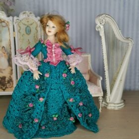 Crocheted dress for miniature dolls