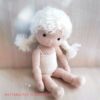 The pattern of a crocheted doll in the Waldorf style