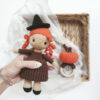 witch doll with pumpkin