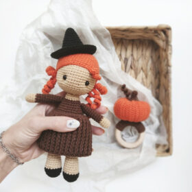 witch doll with pumpkin