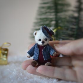 Miniature White Bear Mitya with clothes on