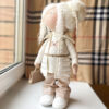Large doll for the interior in a dress in the style of Chanel side view