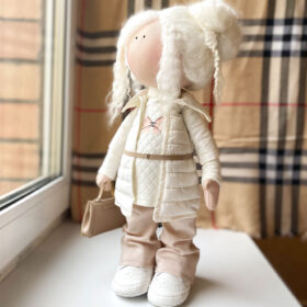 Large doll for the interior in a dress in the style of Chanel side view