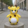 Plush crochet giraffe amigurumi toy, handmade soft animal pattern