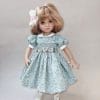 Grey with white flowers Little Darling smocked dress