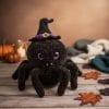 Cute plush Halloween spider amigurumi with witch hat, handmade crochet toy