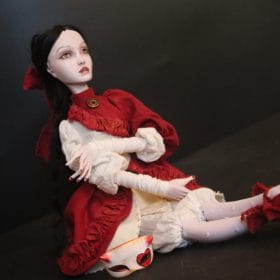 Handmade art doll Carmilla in red cloak and white dress
