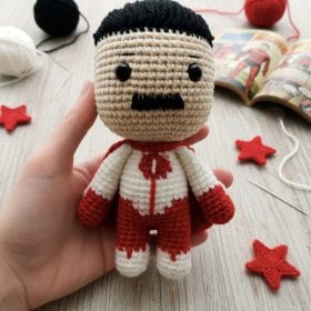 Plush crochet Omni-Man amigurumi toy, inspired by Invincible, handmade pattern