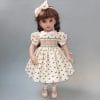 Pale yellow smocked dress