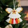 Crochet Christmas angel ornament with yellow and red tassels