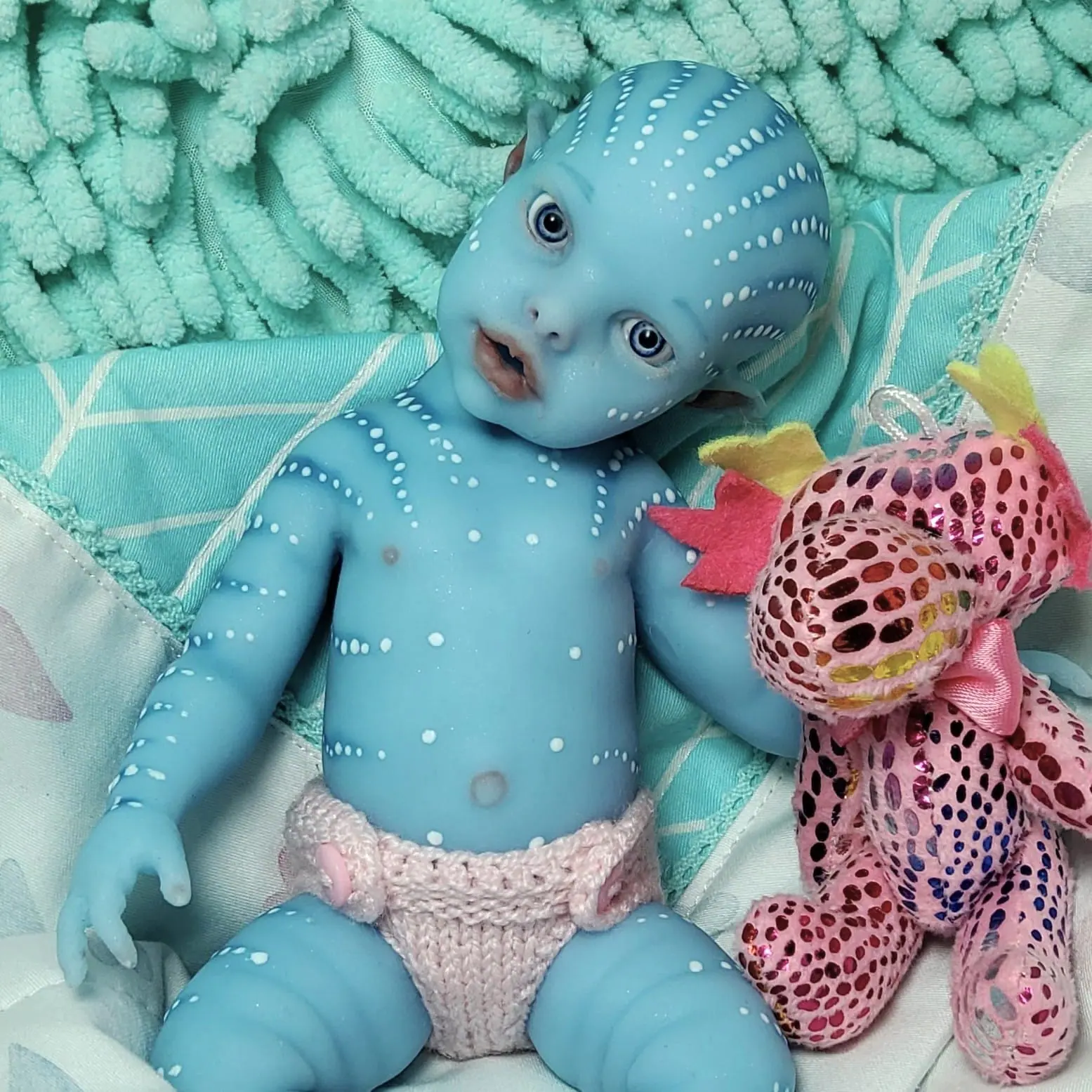 Amazing silicone reborn avatar baby girl 22 cm 15 Reborn avatar baby doll lying on blanket